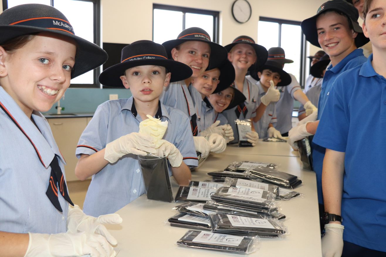 A group of ten students in a lab.